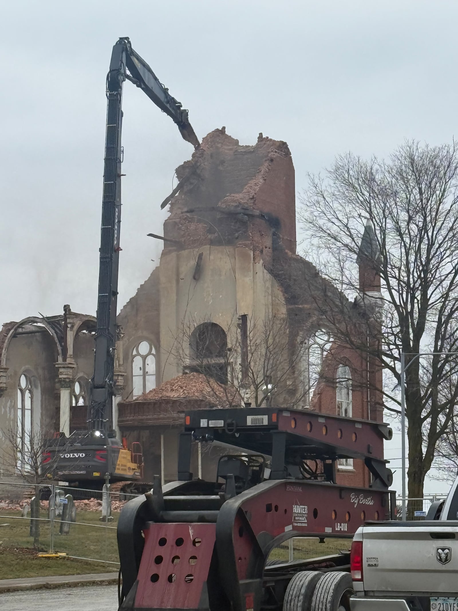 Demolition began on Jan. 7, 2026, at St. John the Baptist Church's bell tower in Maria Stein. The church was previously damaged in a fire last year, and on Dec. 29, 2025, the west wall collapsed during strong winds. Photo courtesy the Archdiocese of Cincinnati.
