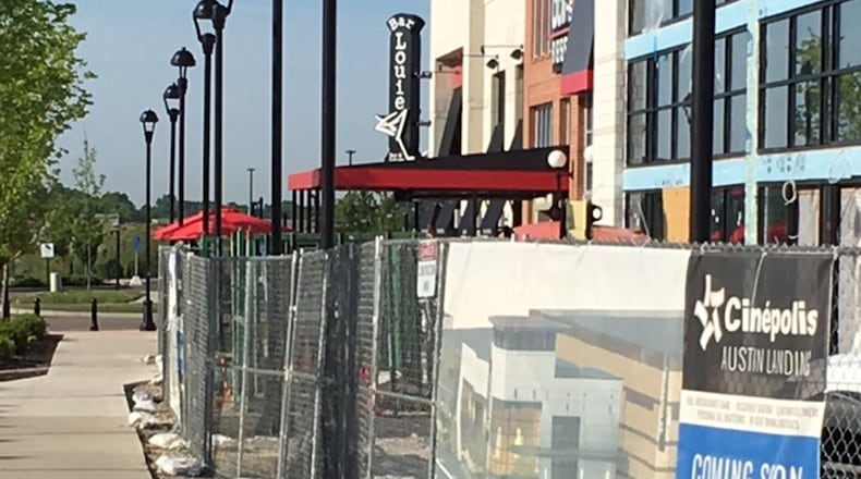 Cinepolis Dayton at Austin Landing is a $12 million project that will feature 12 theaters that seat 1,560. NICK BLIZZARD/STAFF