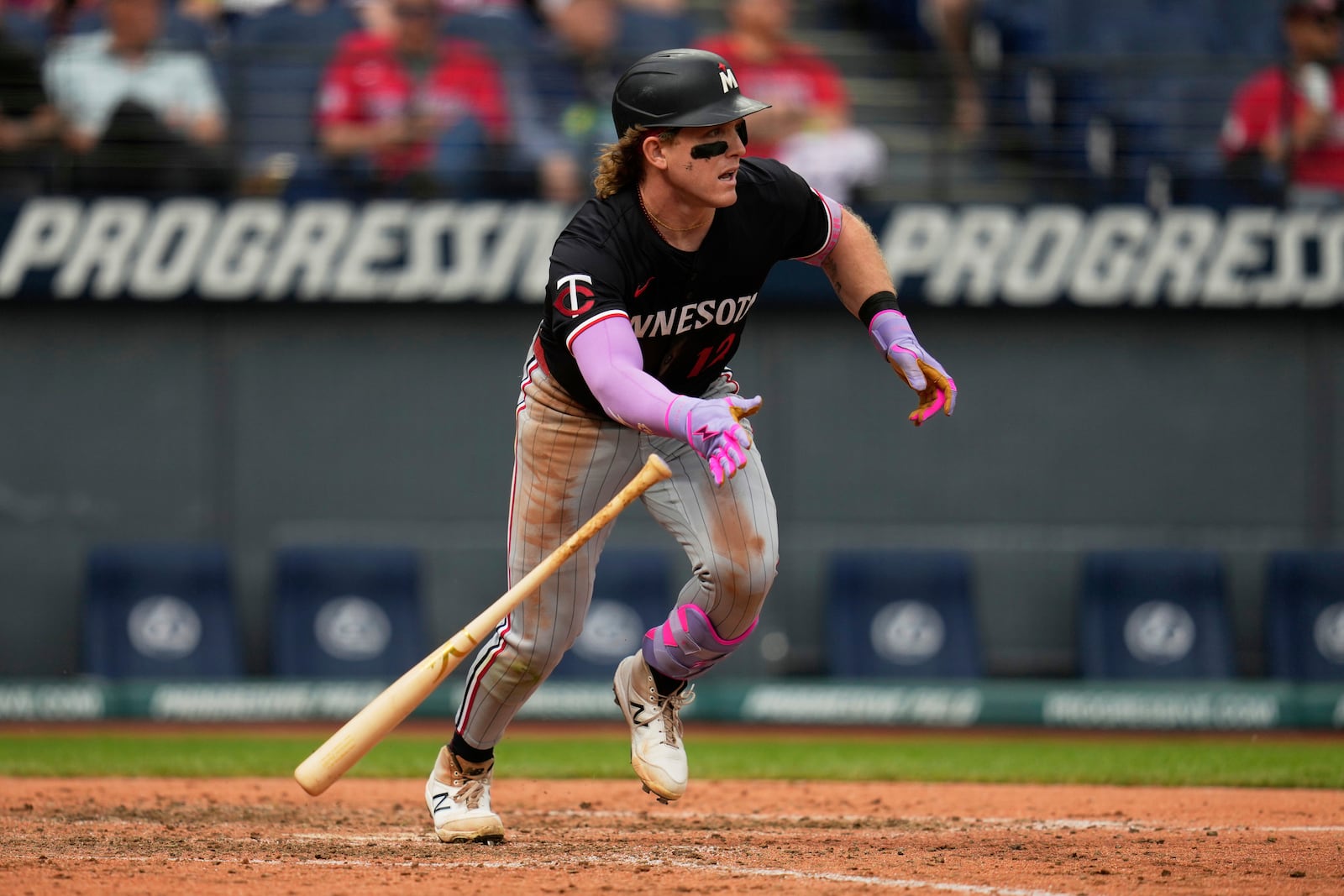 Minnesota Twins' Harrison Bader doubles in the eighth inning of a baseball game against the Cleveland Guardians in Cleveland, Thursday, May 1, 2025. (AP Photo/Sue Ogrocki)