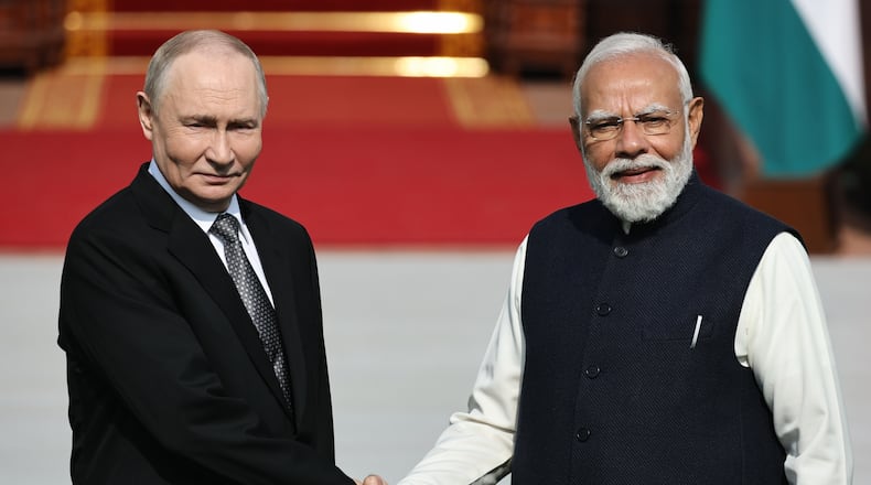 Russian President Vladimir Putin, left, and Indian Prime Minister Narendra Modi pose for a photo prior to their talks in New Delhi, India, Friday, Dec. 5, 2025. (Mikhail Tereshchenko, Sputnik, Kremlin Pool Photo via AP)