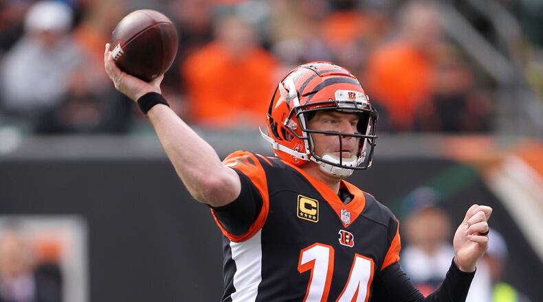 CINCINNATI, OH - NOVEMBER 25: Andy Dalton #14 of the Cincinnati Bengals throws a pass during the first quarter of the game against the Cleveland Browns at Paul Brown Stadium on November 25, 2018 in Cincinnati, Ohio. (Photo by John Grieshop/Getty Images)