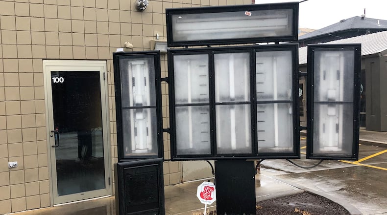The menu board at the drive-through at the Arby's restaurant at 1200 Brown St. has been removed in its entirety. MARK FISHER/STAFF