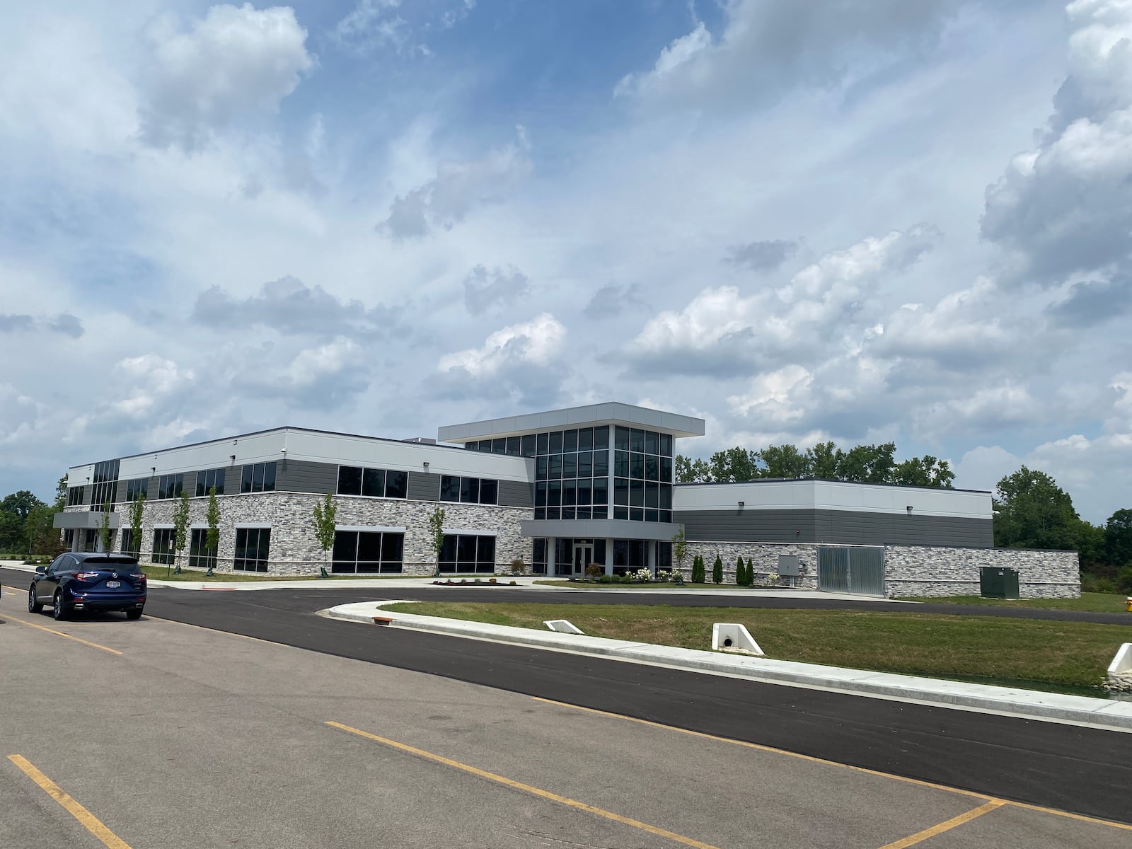 CRG Defense held a ribbon-cutting ceremony for its new 25,763-square-foot headquarters at 8789 Washington Church Road in Miami Twp. on Tuesday, July 15. The two-story facility includes 19,673 square feet of office space and 6,090 square feet of community space, designed to support collaboration and innovation. ERIC SCHWARTZBERG/STAFF