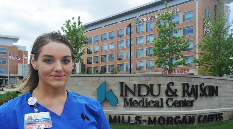 Sara Dulaney, RN, works in the COVID unit at Soin Medical Center. MARSHALL GORBY\STAFF