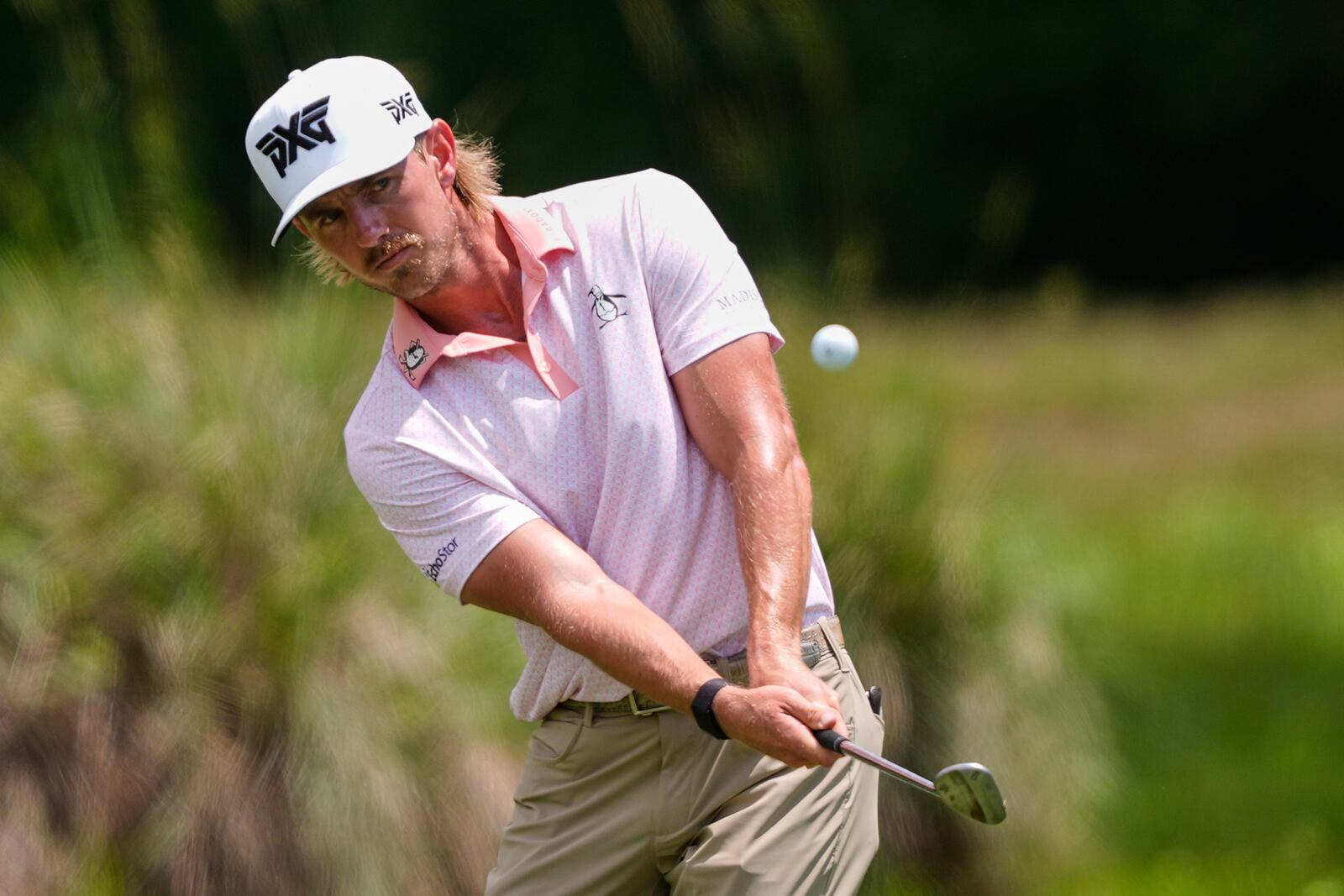 Jake Knapp hits onto the 2nd green during the final round of the PGA Zurich Classic golf tournament at TPC Louisiana in Avondale, La., Sunday, April 27, 2025. (AP Photo/Gerald Herbert)