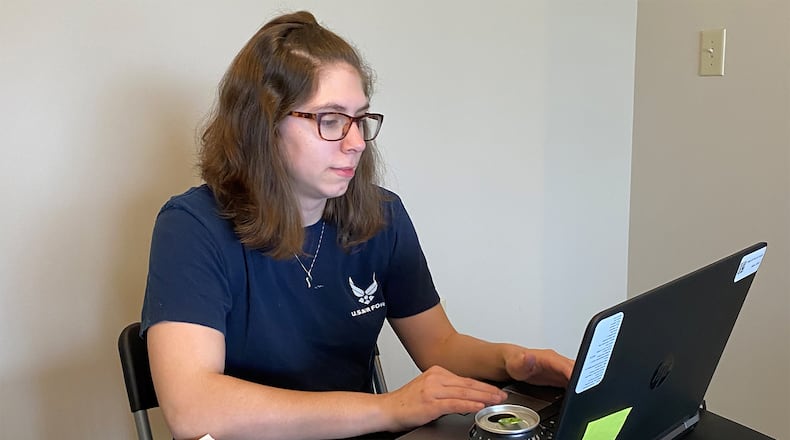 Senior Airman Valerie Graw, a cyber operations controller in the 88th Communications Squadron, Cyber Operations Center, Wright-Patterson Air Force Base, works on the base’s virtual private network, email system, user-submitted tickets and more. (Contributed photo)