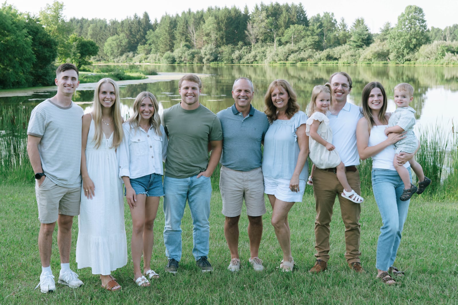 UD running back Levi Moell (4th from left) with his family:  (left to right), Trenton Douthwaite (brother-in-law); Lydia Douthwaite (sister); Sidney Moell (Levi’s wife); Chis Moell (dad); Becky Moell (mom); Dusty Moell (brother) holding daughter Remi; and Tabby Moell (sister-in-law))  holding son Adler. CONTRIBUTED PHOTO