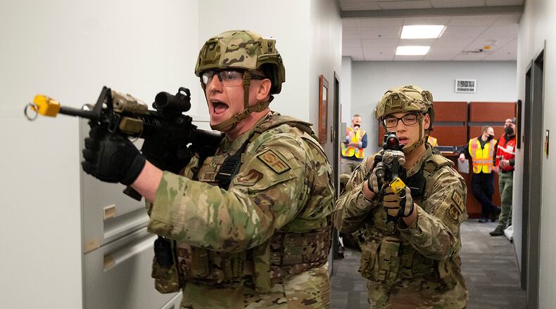 Senior Airman Andrew Barnes, 88th Security Forces Squadron, takes point as Defenders respond to an active-shooter exercise on Feb. 23 at Wright-Patterson Air Force Base. U.S. AIR FORCE PHOTO/R.J. ORIEZ