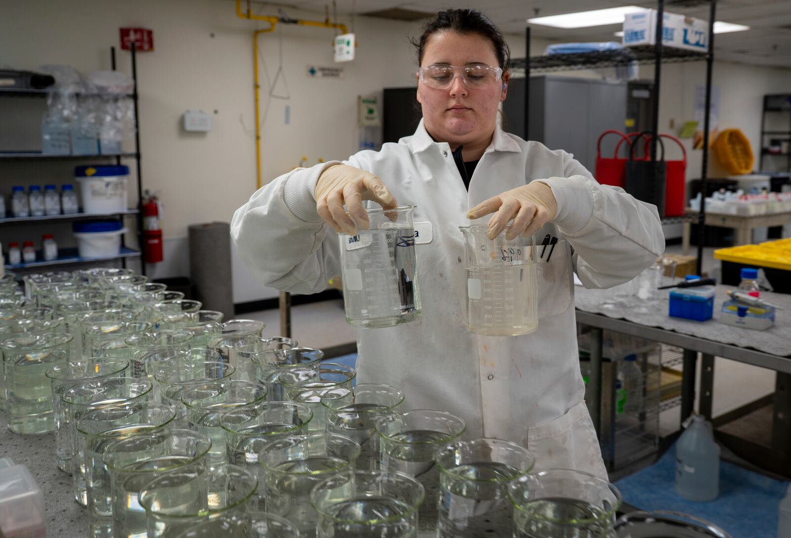 Olivia Carr, a scientist with Eurofins Environment Testing in Earth City, Mo., conducts radium analysis with water samples at the company's lab in suburban St. Louis, on Monday, March 3, 2025. Staff at Eurofins administered similar tests to water samples collected by The Toledo Blade newspaper. (Sid Hastings/The Blade via AP)