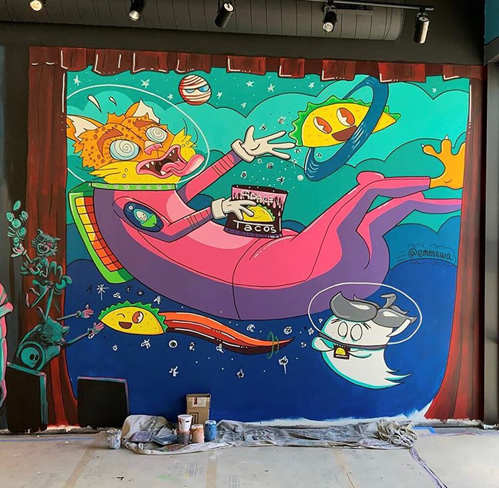 PHOTOS: Wild and wacky murals take over new restaurant at The Greene