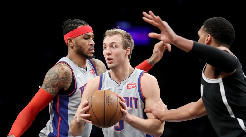 NEW YORK, NY - JANUARY 10: Luke Kennard #5 of the Detroit Pistons looks to pass the ball in the fourth quarter against the Brooklyn Nets during their game at Barclays Center on January 10, 2018 in the Brooklyn borough of New York City. NOTE TO USER: User expressly acknowledges and agrees that, by downloading and or using this photograph, User is consenting to the terms and conditions of the Getty Images License Agreement.  (Photo by Abbie Parr/Getty Images)