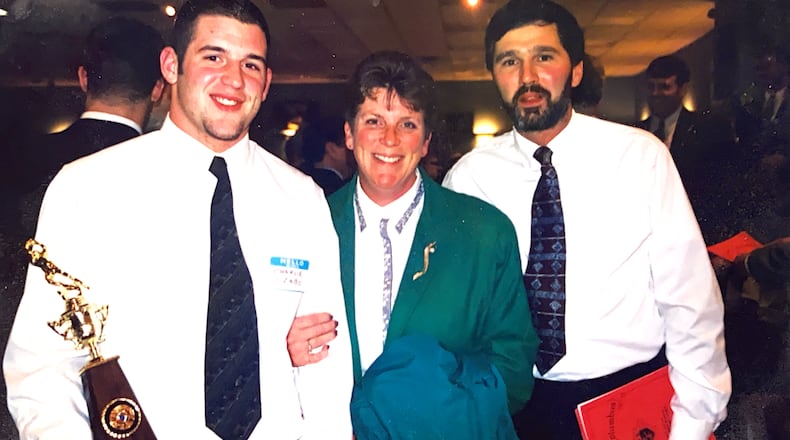 Chaminade Julienne boys basketball coach Charlie Szabo (left) with his parents Ann and Chuck Szabo at the GCL football banquet after his senior season in 1997. CONTRIBUTED/Charlie Szabo