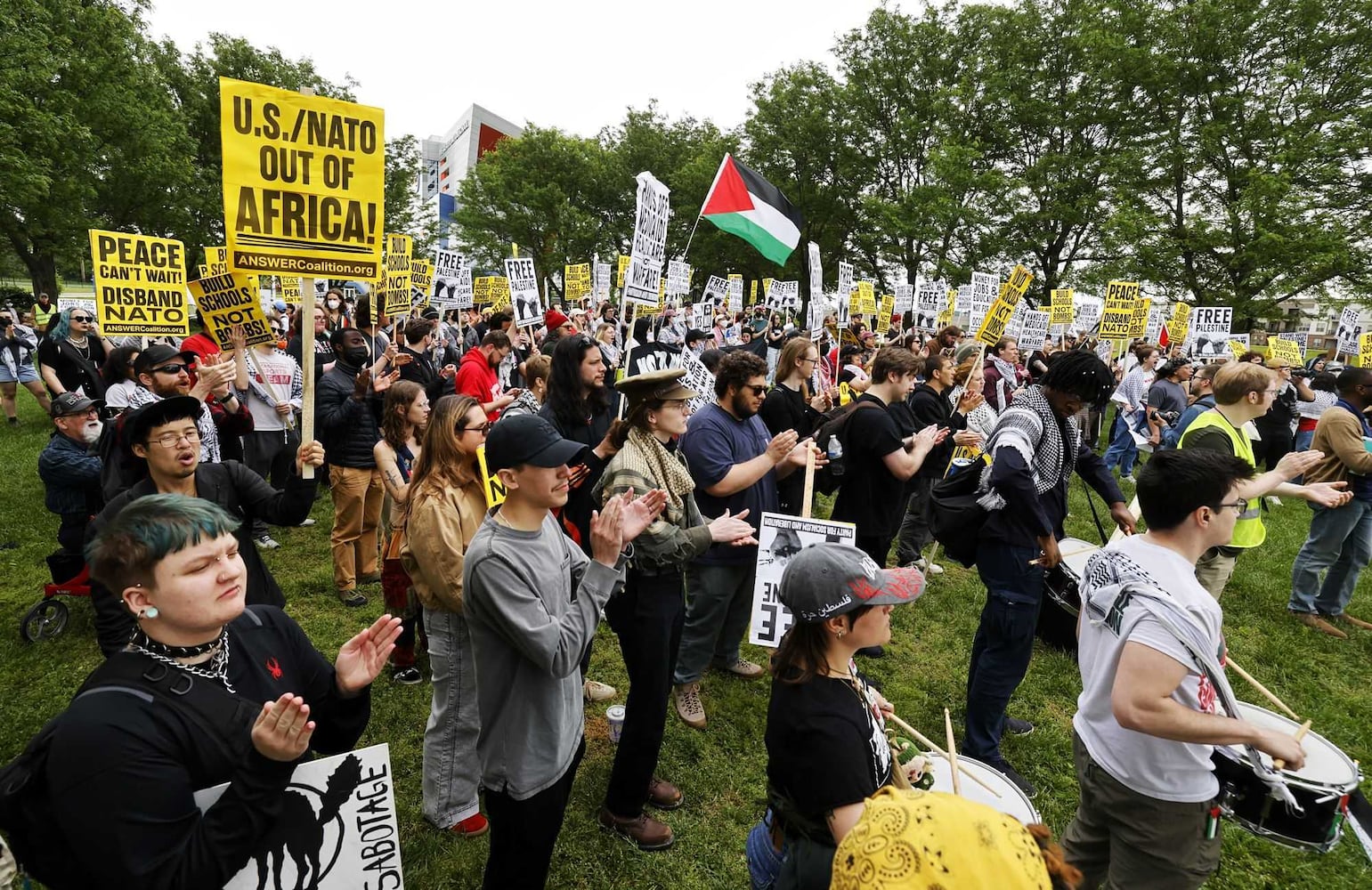 Protesters rally at Deeds Point during NATO assembly