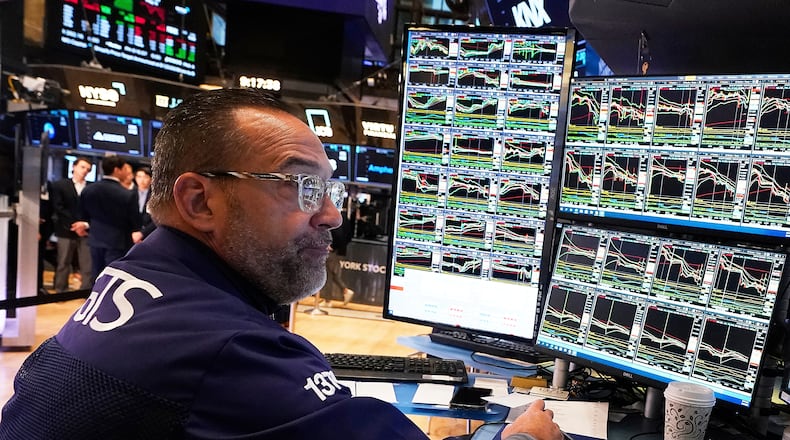 FILE - Specialist Anthony Matesic works on the floor of the New York Stock Exchange, Tuesday, May 6, 2025. (AP Photo/Richard Drew, File)