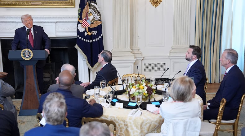 President Donald Trump speaks during a breakfast with Senate and House Republicans in the State Dining Room of the White House, Wednesday, Nov. 5, 2025, in Washington. Senate Majority Leader John Thune, R-S.D. and Vice President JD Vance, seated right. (AP Photo/Evan Vucci)