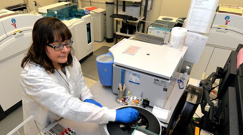Bonnie Lofthouse, 88th Diagnostics and Therapeutics Squadron lab flight medical technician, Wright-Patterson Medical Center, performs patient blood sample testing. The 88th Medical Group received The Joint Commission accreditation and for the first time, received Primary Care Medical Home certification. A team of surveyors from The Joint Commission were onsite at the medical center Feb. 13-16, assessing the center for compliance in standards of hospital practices. (U.S. Air Force photo/Al Bright)