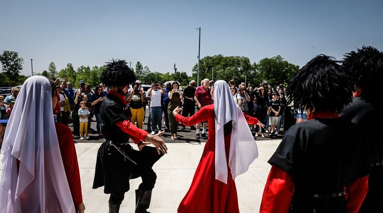 The Ahiska Dance Group performed at the grand opening of the Dayton Metro Library Huber Heights Branch Friday June 2, 2023. JIM NOELKER/STAFF