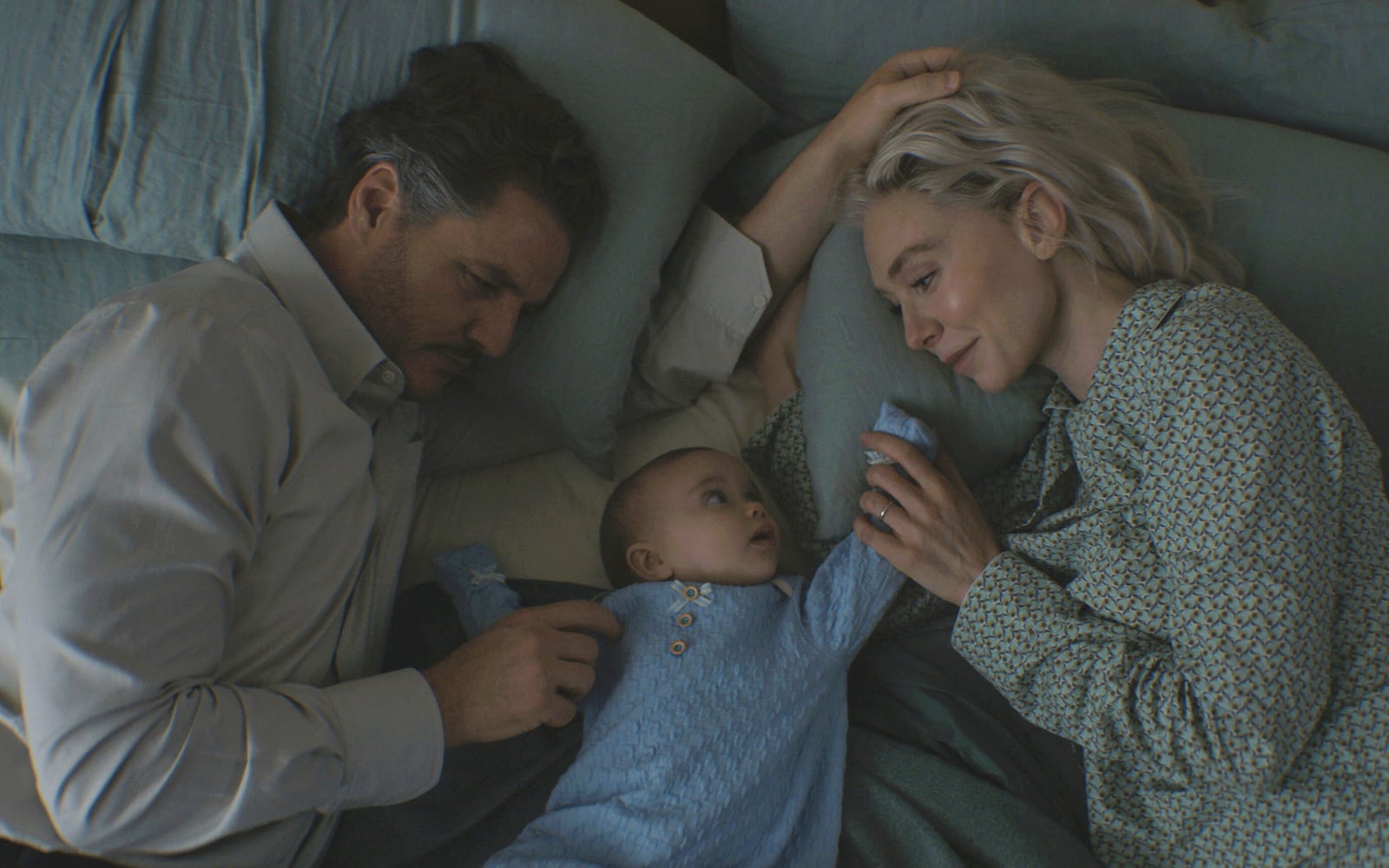 This image released by Disney shows Pedro Pascal, from left, Ada Scott and Vanessa Kirby in a scene from "The Fantastic Four: First Steps." (Marvel/Disney via AP)