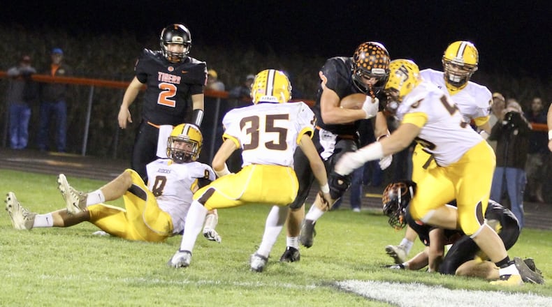 West Liberty-Salem’s Braden Miller runs the ball against West Jefferson at Tiger Stadium on Friday, Oct. 20. MICHAEL COOPER/STAFF