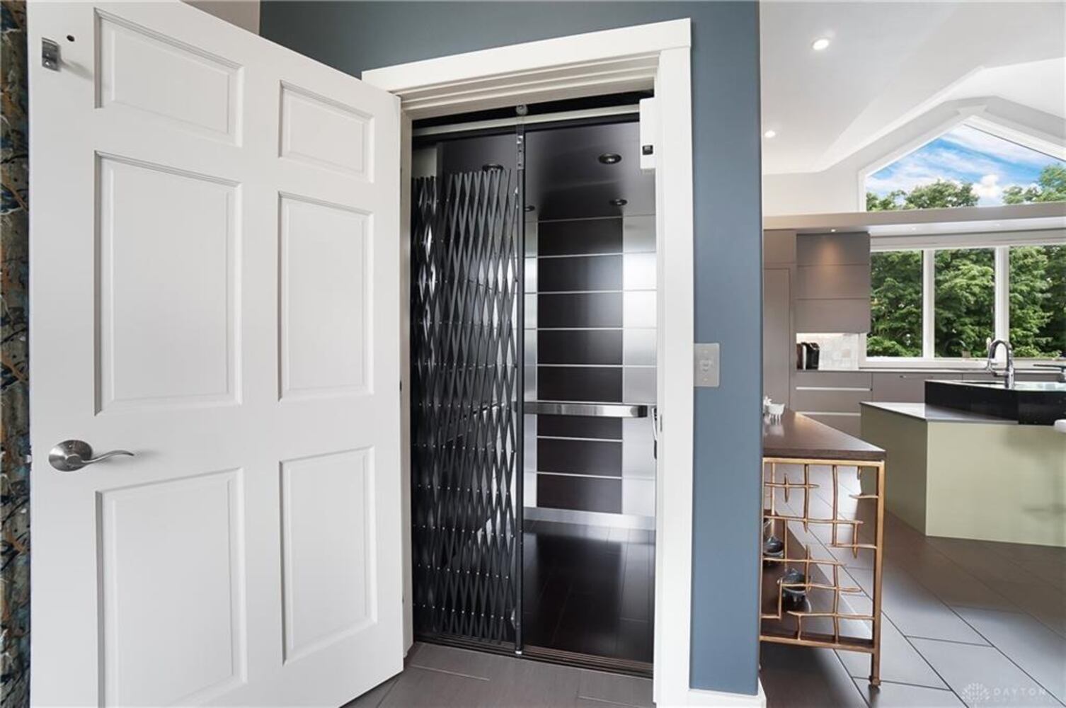 PHOTOS: Spectacular $1.8M luxury home on market with pool, golf simulator