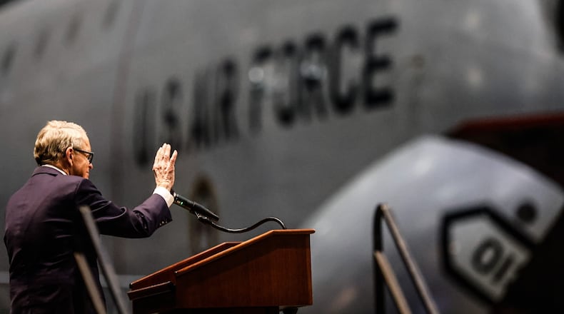 Ohio Gov. Mike DeWine held a news conference at the National Museum of the US Air Force Wednesday February 1, 2023, to promote his initiative to create new innovation hubs throughout the state. JIM NOELKER/STAFF