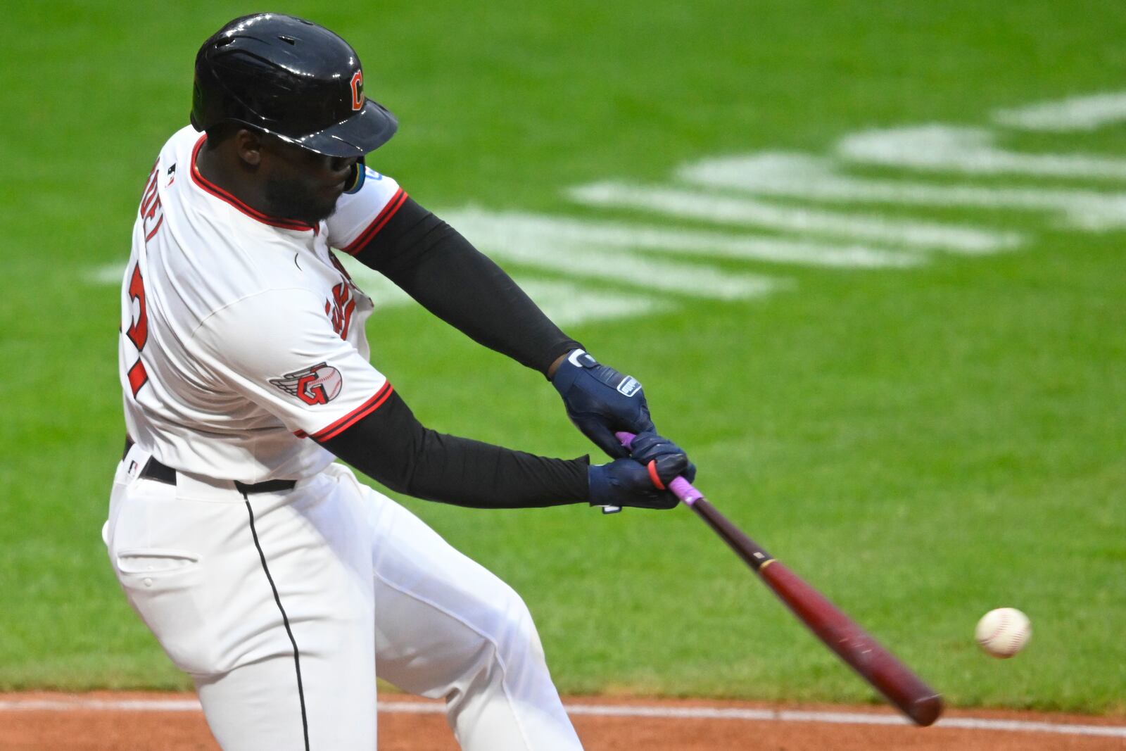 Cleveland Guardians' Jhonkensy Noel hits a two-run home run against the Boston Red Sox during the fourth inning of the second baseball game of a doubleheader, Saturday, April 26, 2025, in Cleveland, (AP Photo/David Richard)