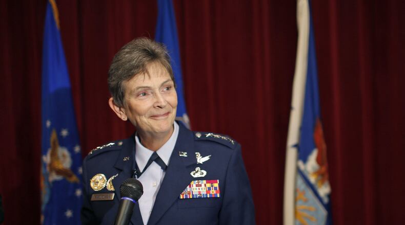 Gen. Ellen M. Pawlikowski was handed the Command Flag for the Air Force Materiel Command on Monday at Wright-Patterson Air Force Base during a ceremony where her predecessor, Gen. Janet Wolfenbarger also retired from the Air Force after a 35-year career. TY GREENLEES / STAFF