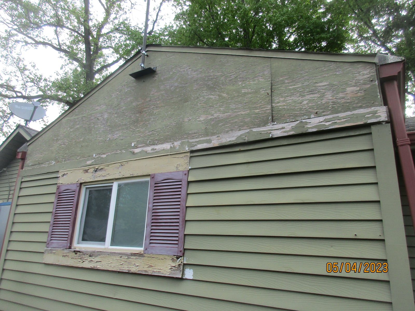 An assessment of Bill Trent's Courtland Avenue house in Kettering discovered lead paint on the siding, windows, gutters and garage doors of the house built in 1930. CONTRIBUTED
