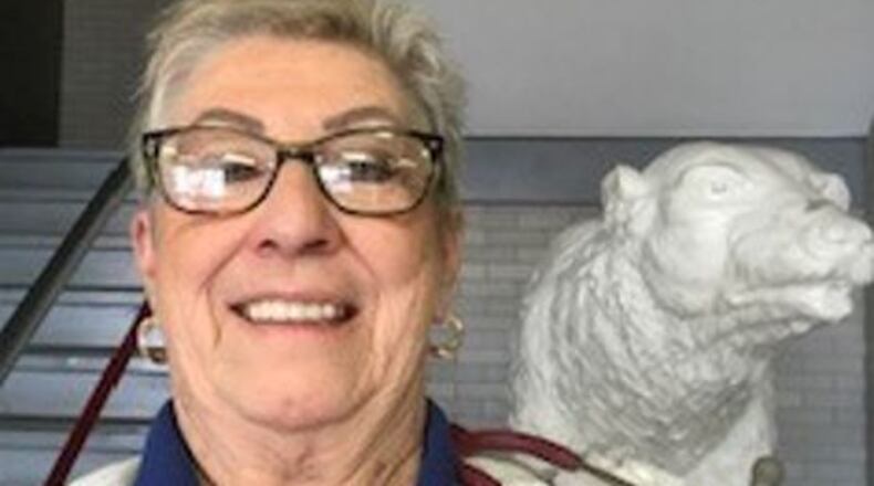 Sheila Sutton at Northridge High School giving flu shots to staff. She graduated from NHS in 1965. CONTRIBUTED