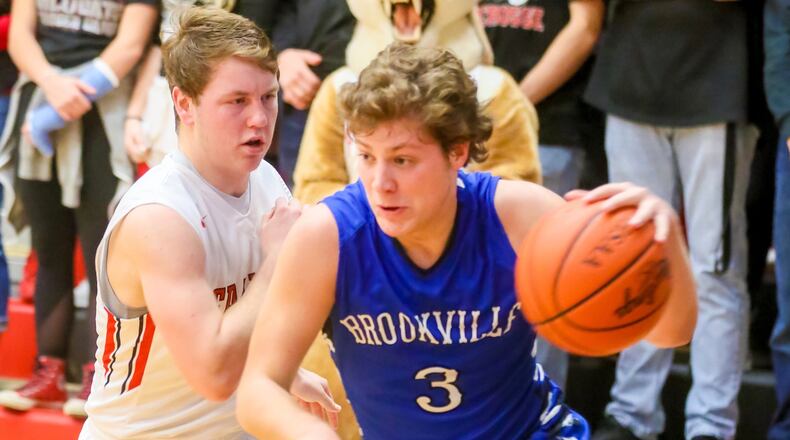Brookville guard Dalton Stewart (3) drives to the basket during their game at Franklin, Tuesday, Feb. 7, 2017. GREG LYNCH / STAFF