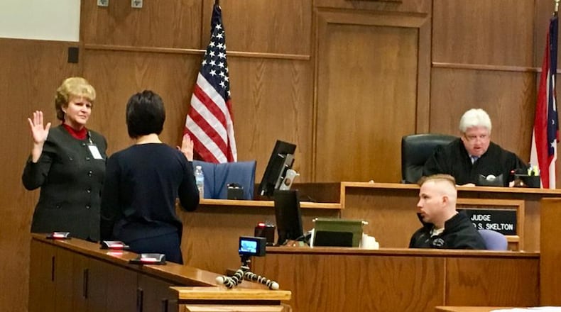 Dayton Public Schools Superintendent Elizabeth Lolli is sworn in in March 2018 to testify in David Esrati’s open meetings lawsuit against DPS and the city of Dayton. MARK GOKAVI / STAFF