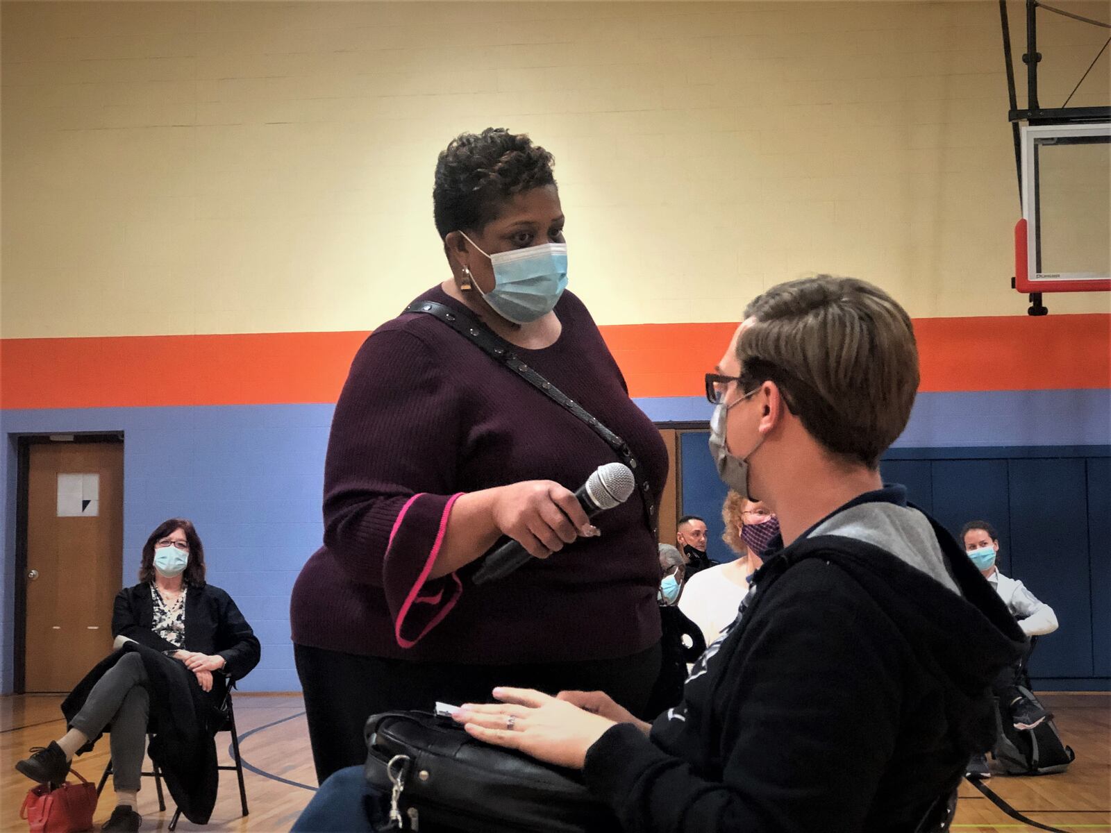 Dayton community member Kegan Sickels asks questions at a recent community meeting of Verletta Jackson, Dayton's community engagement division manager. CORNELIUS FROLIK / STAFF