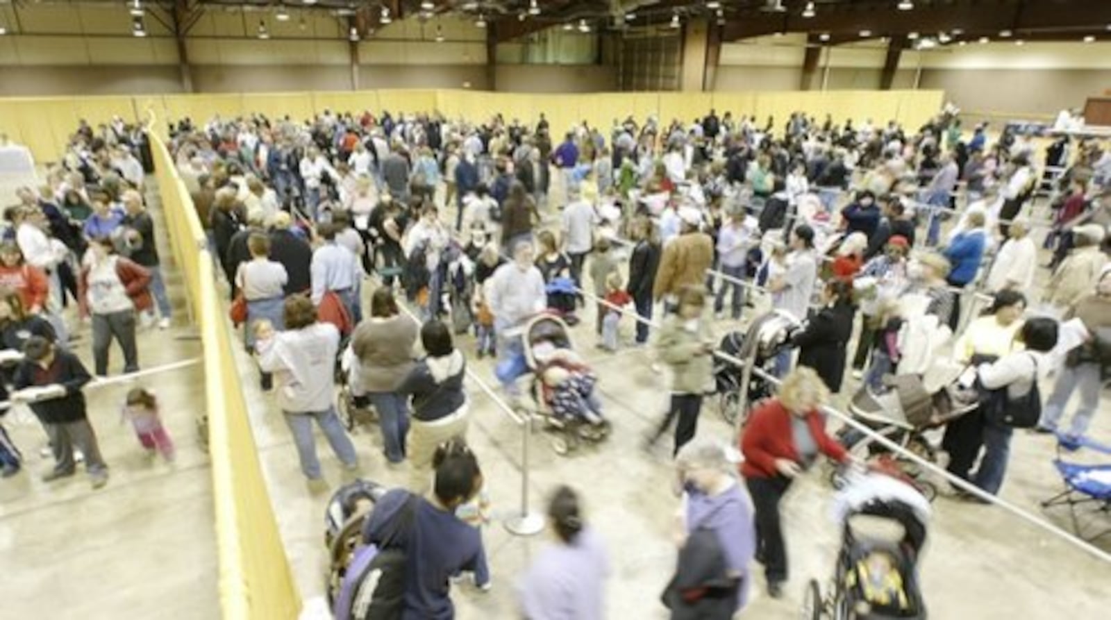 File - People pictured receiving H1N1 flu vaccinations Nov. 12, 2009 at the former Hara Arena complex at a Public Health - Dayton & Montgomery County clinic. The 2009-2010 H1N1 flu pandemic is an example of where Public Health had volunteers from its region of the Ohio Medical Reserve Corps provide support. Public Health is currently looking for more volunteers for its Medical Reserve Corps region to build up its base of volunteers after losing some volunteers after the COVID-19 pandemic. STAFF FILE