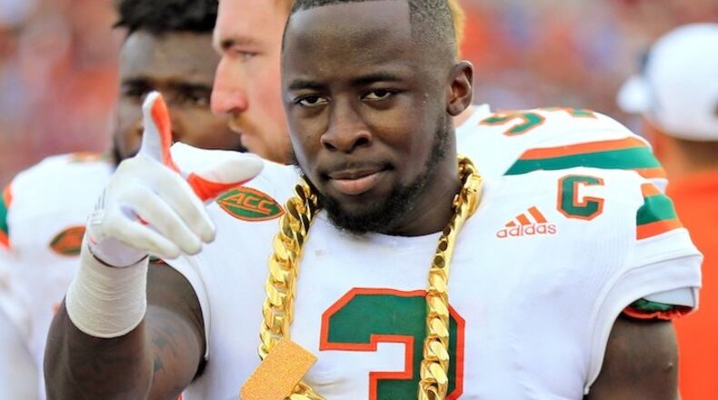 Miami defensive back Dee Delaney (3) with the turnover chain after intercepting a pass against Florida State at Doak Campbell Stadium in Tallahassee, Fla., on October 7, 2017. (Al Diaz/Miami Herald/TNS)