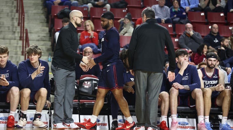 Dayton's Posh Alexander leaves the court after injuring his ankle in the second half against Massachusetts on Wednesday, Jan. 8, 2025, at the Mullins Center in Amherst, Mass. David Jablonski/Staff