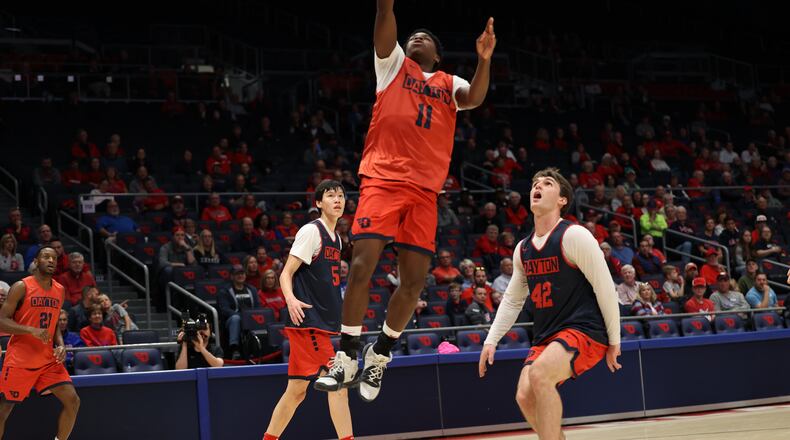 Dayton's Malachi Smith scores during the Red & Blue Game on Saturday, Oct. 15, 2022, at UD Arena. David Jablonski/Staff