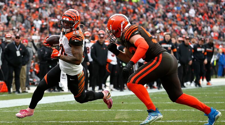 CLEVELAND, OH - DECEMBER 8: Joe Schobert #53 of the Cleveland Browns forces Joe Mixon #28 of the Cincinnati Bengals out of bounds short of the end zone during the third quarter at FirstEnergy Stadium on December 8, 2019 in Cleveland, Ohio. Cleveland defeated Cincinnati 27-19. (Photo by Kirk Irwin/Getty Images)