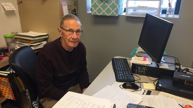 Beavercreek resident Bob Weidner working on final lessons at his Troy Christian School desk in preparation for retirement after a 60-year career. CONTRIBUTED