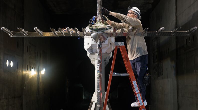 Ashley Dement, an electrical technician lead, works on a rake used to characterize the flow of the Arnold Engineering Development Complex 16-foot Supersonic Wind Tunnel March 24 at Arnold Air Force Base, Tenn. U.S. Air Force photo/Jill Pickett