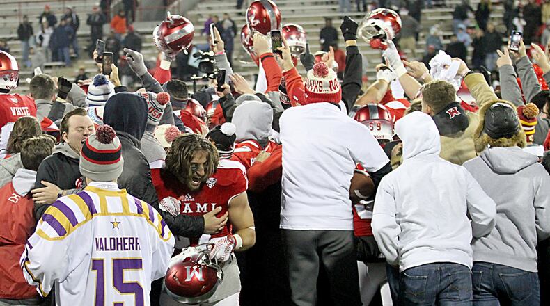 Students and fans celebrate with the RedHawks after Miami beat Ball State for its sixth straight win at Yager Stadium in Oxford on Tuesday. Contributed photo by E.L. Hubbard