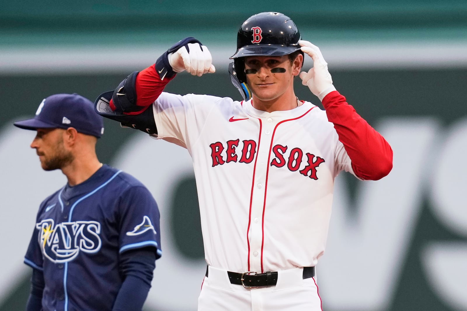 Boston Red Sox rookie Roman Anthony celebrates after his two RBI double, his first major league hit, during the first inning of a baseball game against the Tampa Bay Rays at Fenway Park, Tuesday, June 10, 2025, in Boston. (AP Photo/Charles Krupa)