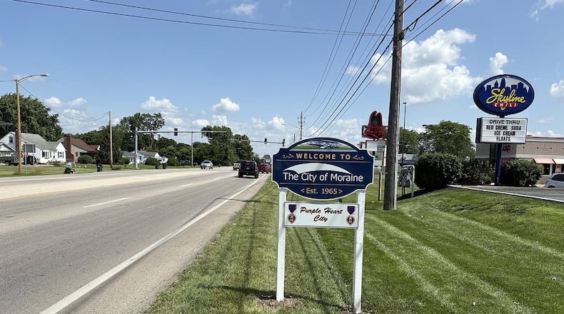 One of 33 recently installed signs that welcome people to Moraine, celebrate the city's history and mark a milestone. The new signs posted at all city entrances feature graphics incorporating the Wright Seaplane and a reference to Moraine becoming a city in 1965. CONTRIBUTED