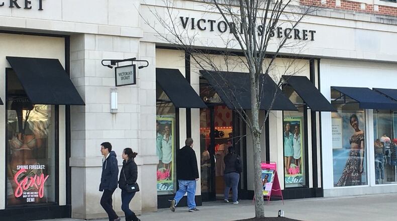 STORE CLOSINGS: Shoppers walk through The Greene in Beavercreek. KARA DRISCOLL/STAFF