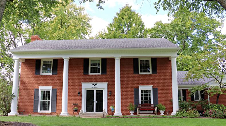 The brick 2-story has about 4,100 sq. ft. of living space with traditional formal areas and cozy casual space. The house has 4 bedrooms and sits on a curved, 0.82-acre lot with a side-entry, 2-car garage. CONTRIBUTED PHOTO BY KATHY TYLER