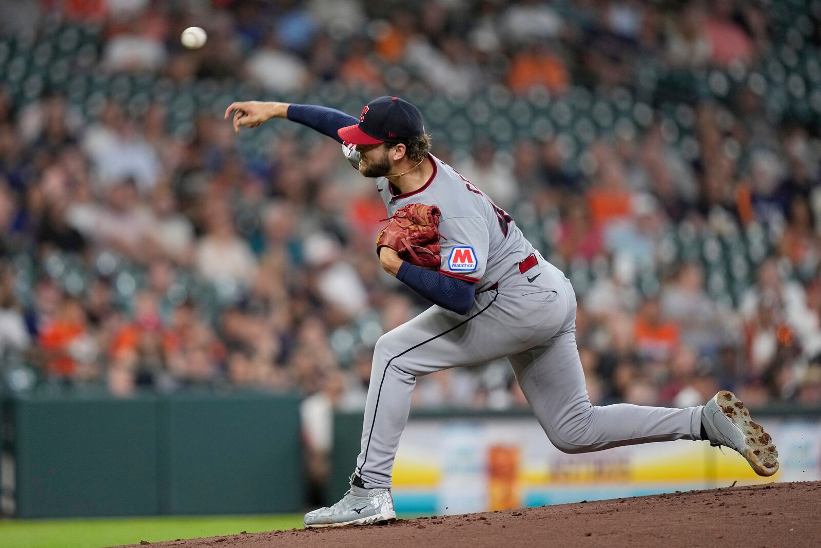 Cleveland Guardians starting pitcher Slade Cecconi throws against the Houston Astros during the first inning of a baseball game Wednesday, July 9, 2025, in Houston. (AP Photo/David J. Phillip)