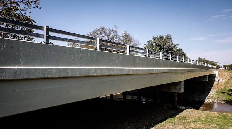 The Lamme Road bridge over Holes Creek on the Moraine-Miami Twp. border has been replaced, and the road reopened Friday, Oct. 13, 2023. Jim Noelker/Staff