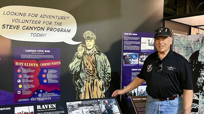 Air Force veteran and Raven Gene Hamner visits the Ravens exhibit at the National Museum of the U.S. Air Force on the day of its opening. A photo of the young Gene Hamner during his service is on the far right of the display. CONTRIBUTED