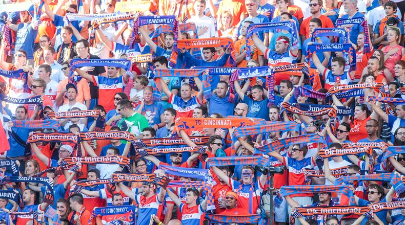 Fans cheer on the FC Cincinnati team as they play English Premier League team Crystal Palace in a friendly match Saturday, July 16 at Nippert Stadium in Cincinnati. NICK GRAHAM