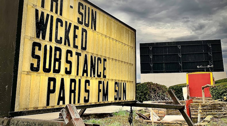A temporary sign at the Dixie Twin Drive-In located at 6201 N. Dixie Drive, in Harrison Twp. The Drive-In will kick off its 69th season this weekend. MARSHALL GORBY\STAFF