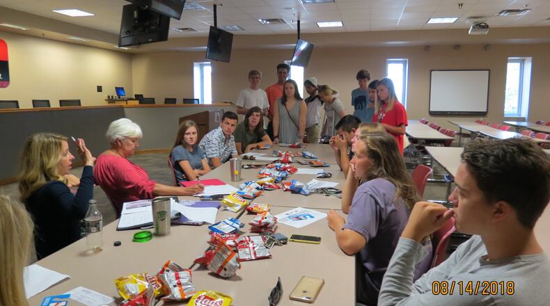A recent meeting of the leaders of the Fairfield High School’s anti-drug Coalition Youth at the Butler County school. MICHAEL D. CLARK/STAFF